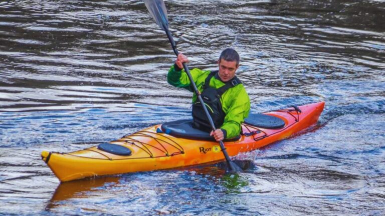 A Person in a Kayak Starts Paddling and It Accelerates